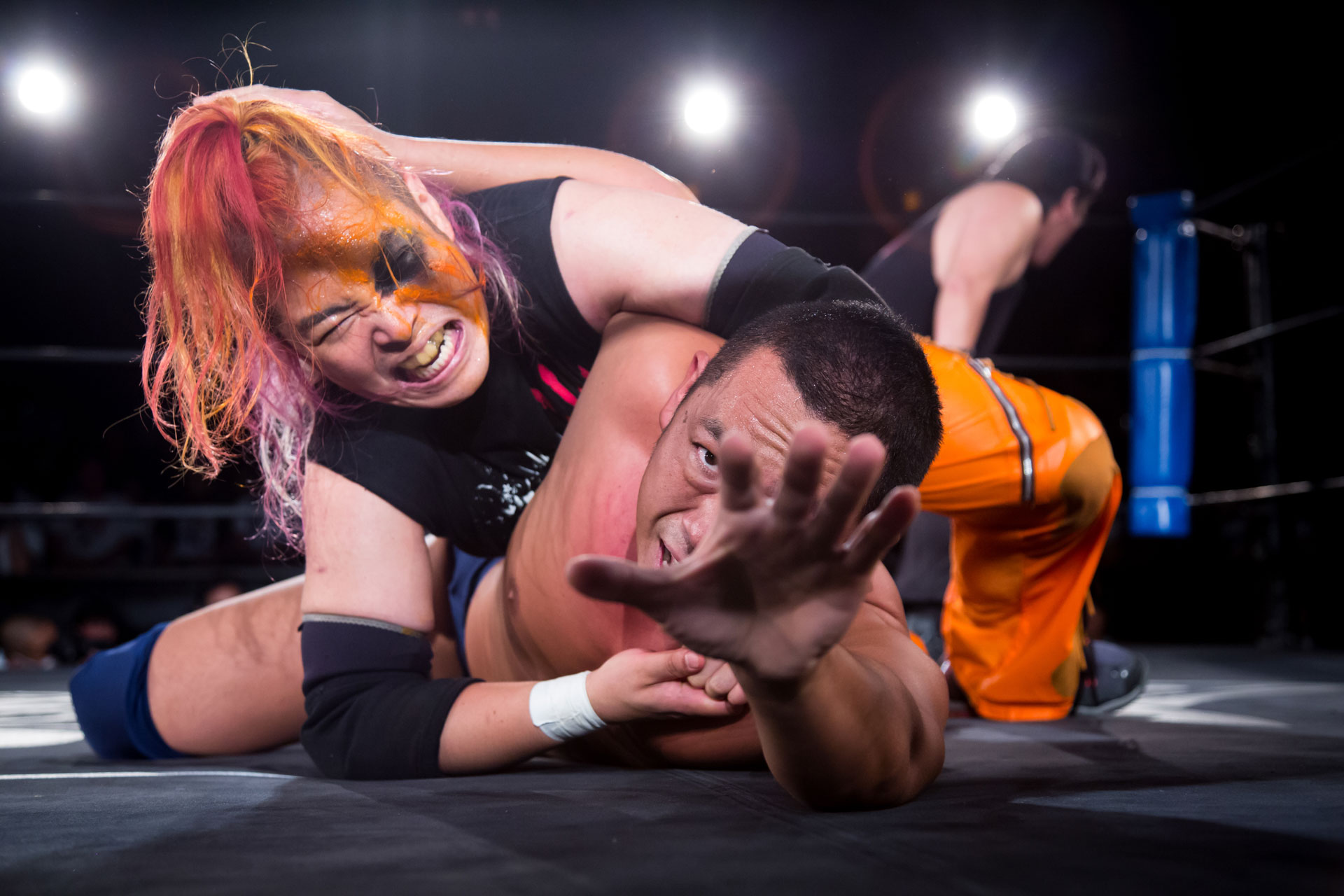 Wrestlers competing in the ring